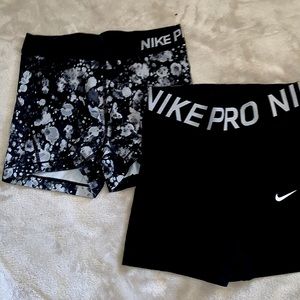 2 pairs of nike pro spandex